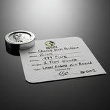 Zinc round with engraved portrait and label on a white background