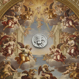 Silver coin with a face design on a gray background